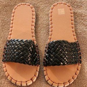 Never worn black woven sandals